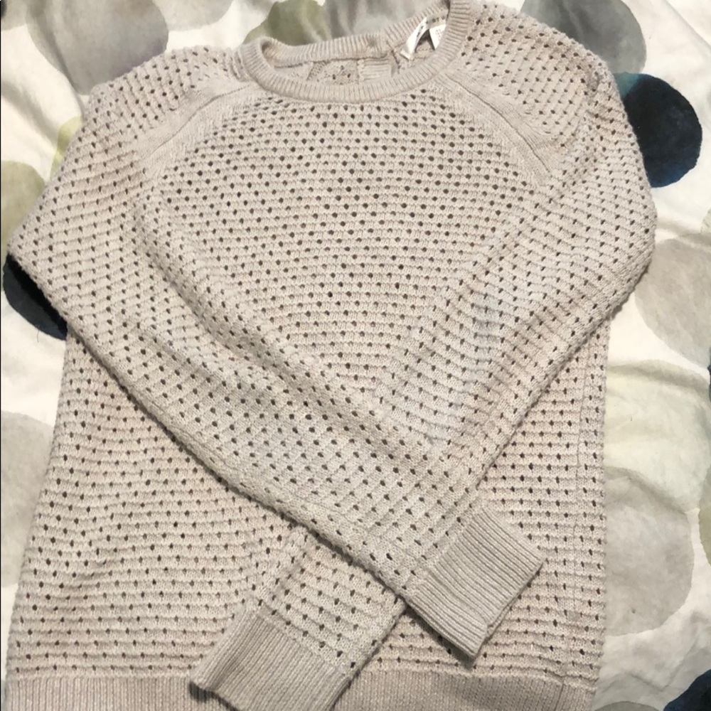 Sweater with buttons down the back
